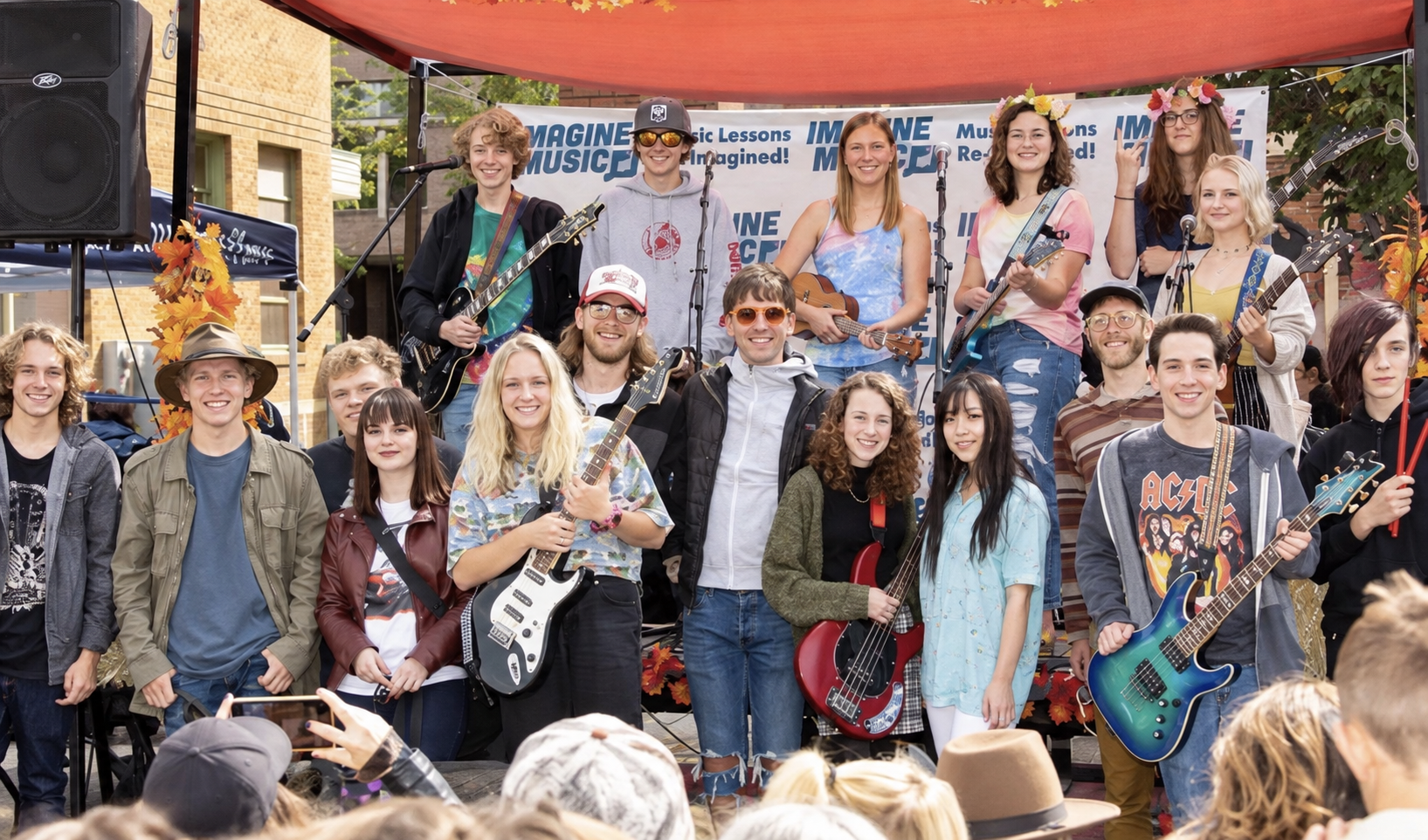 Imagine Music students and teachers together onstage at the 2019 Harvest Moon Festival in Ogden