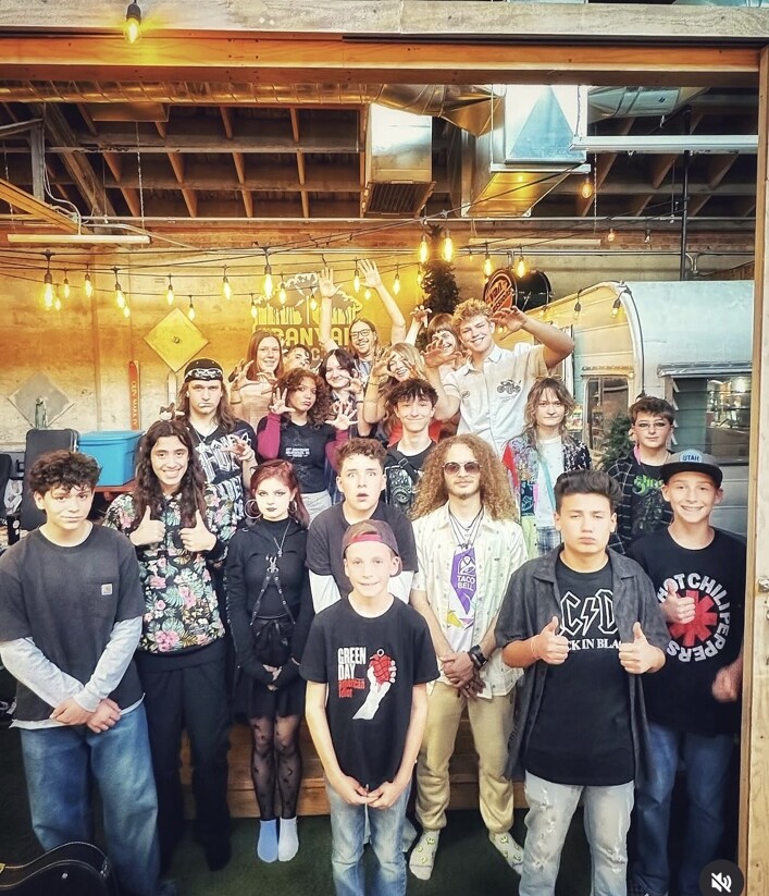 Imagine Music Rock Academy students together after performing at Van Sessions